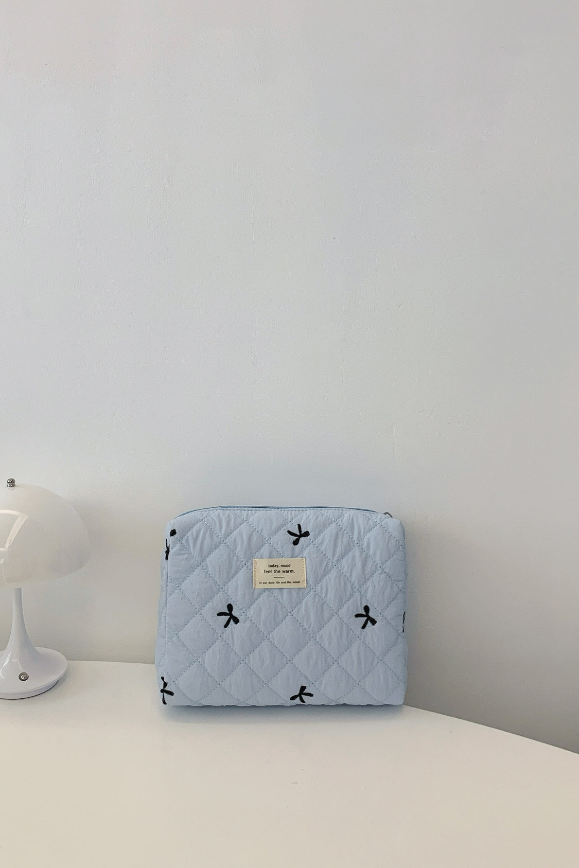 Medium Bow Embroidered Quilted Storage Bag