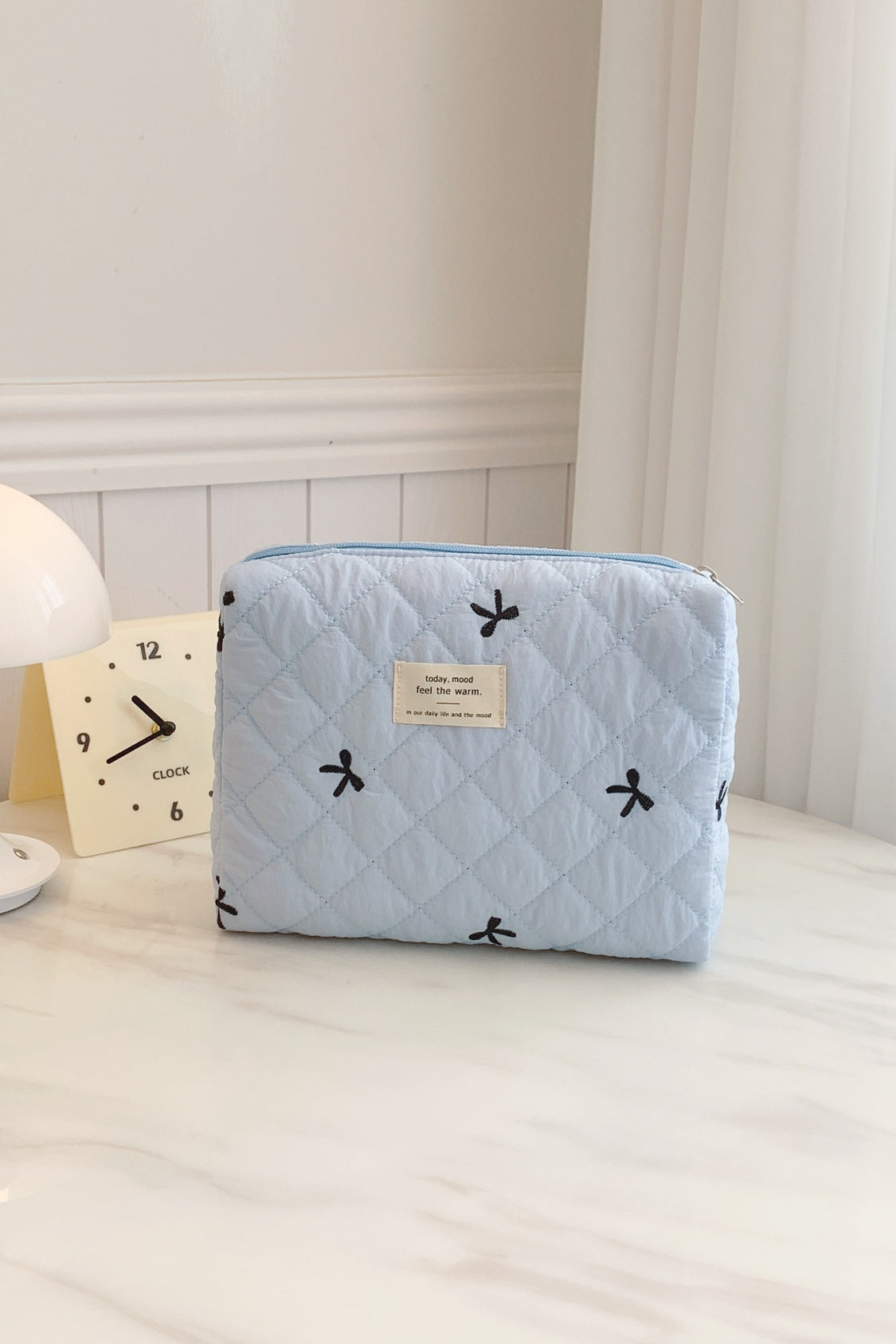 Medium Bow Embroidered Quilted Storage Bag