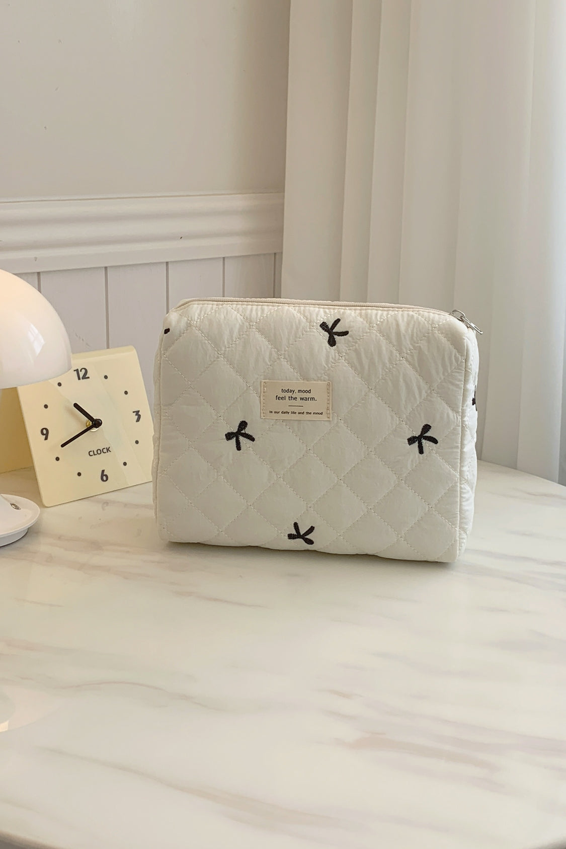 Medium Bow Embroidered Quilted Storage Bag