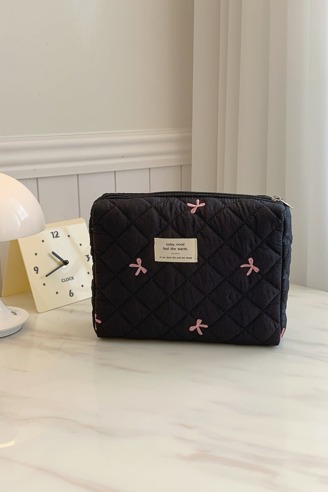 Medium Bow Embroidered Quilted Storage Bag