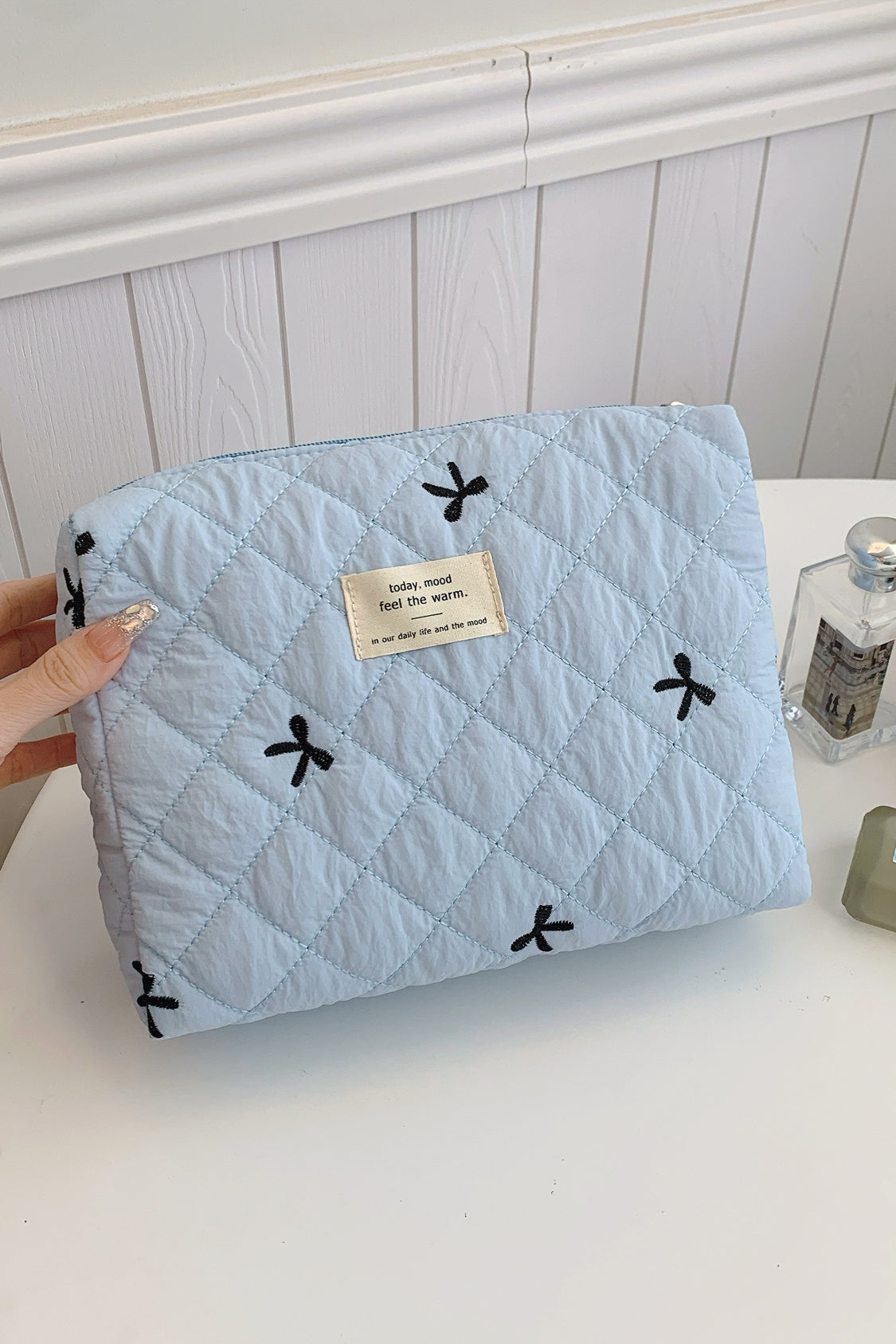 Medium Bow Embroidered Quilted Storage Bag
