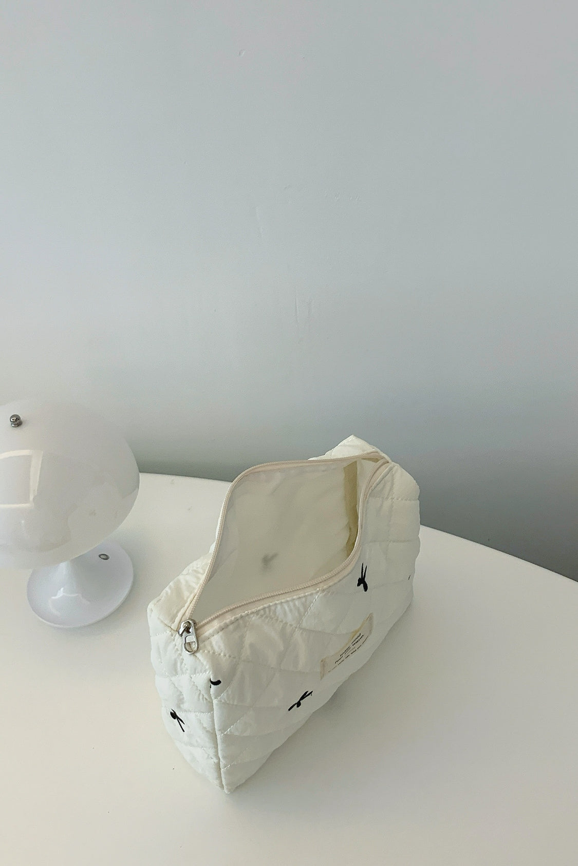 Medium Bow Embroidered Quilted Storage Bag