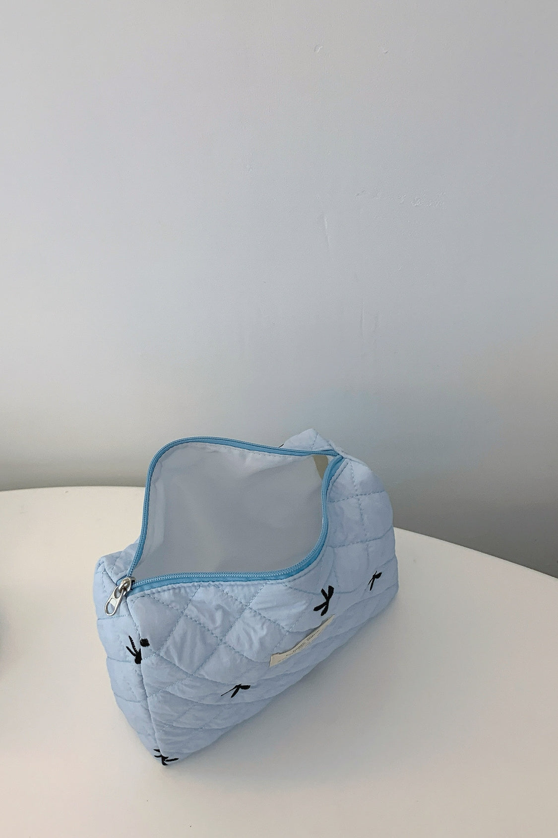 Medium Bow Embroidered Quilted Storage Bag