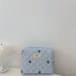 Medium Bow Embroidered Quilted Storage Bag