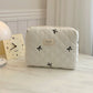 Medium Bow Embroidered Quilted Storage Bag