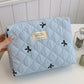 Medium Bow Embroidered Quilted Storage Bag