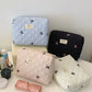 Medium Bow Embroidered Quilted Storage Bag